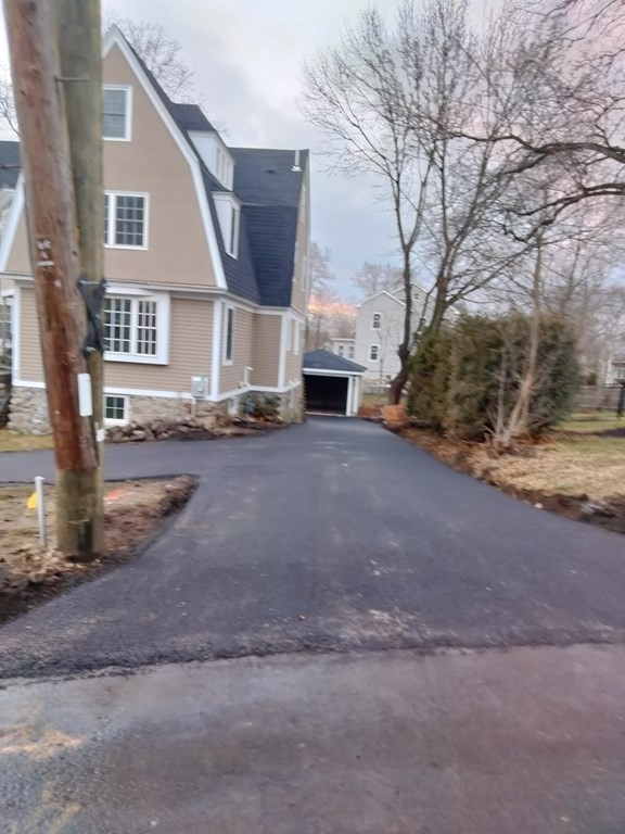 26 Woodleigh Road Dedham, MA 02026 - Photo 2 of 35 a view of a house with a yard