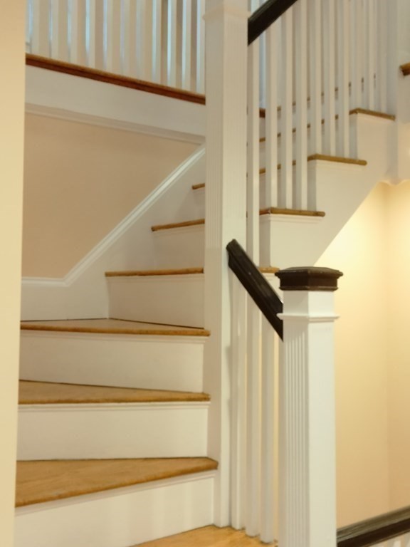 26 Woodleigh Road Dedham, MA 02026 - Photo 26 of 35 a view of entryway with wooden floor