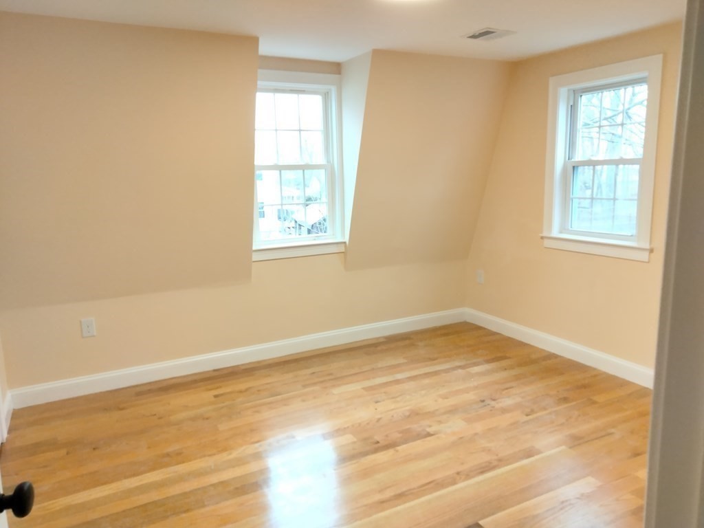 26 Woodleigh Road Dedham, MA 02026 - Photo 29 of 35 a view of an empty room with a window