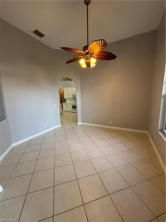 a view of a room with a hanging floor and chandelier