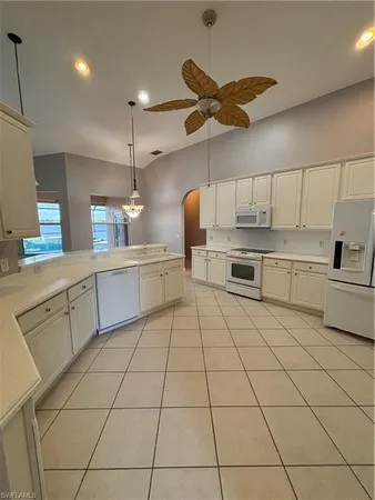 a large kitchen with cabinets