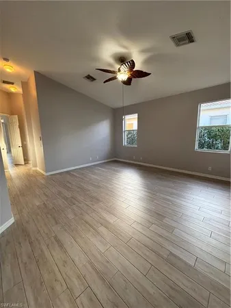 a view of an empty room and window