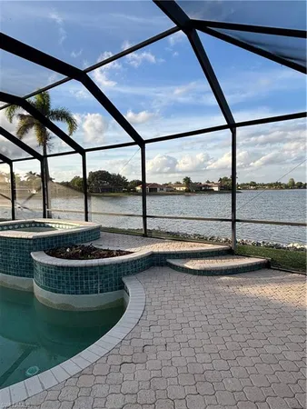 a view of a backyard of the house