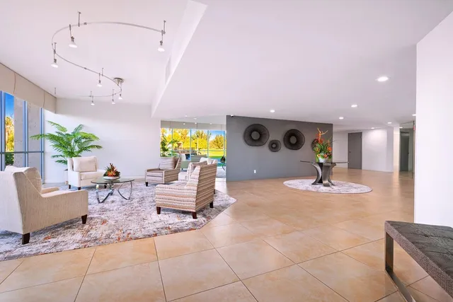 a living room with furniture and a table