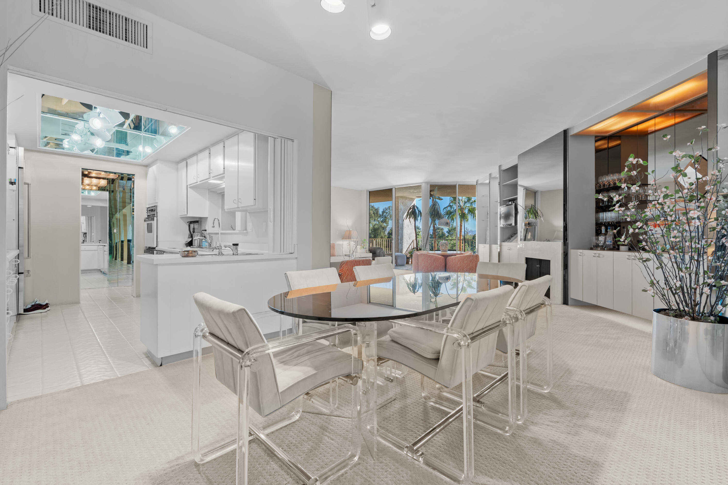 900 Island Drive, Unit 507 Rancho Mirage, CA 92270 - Photo 8 of 37 a dining room with furniture and wooden floor