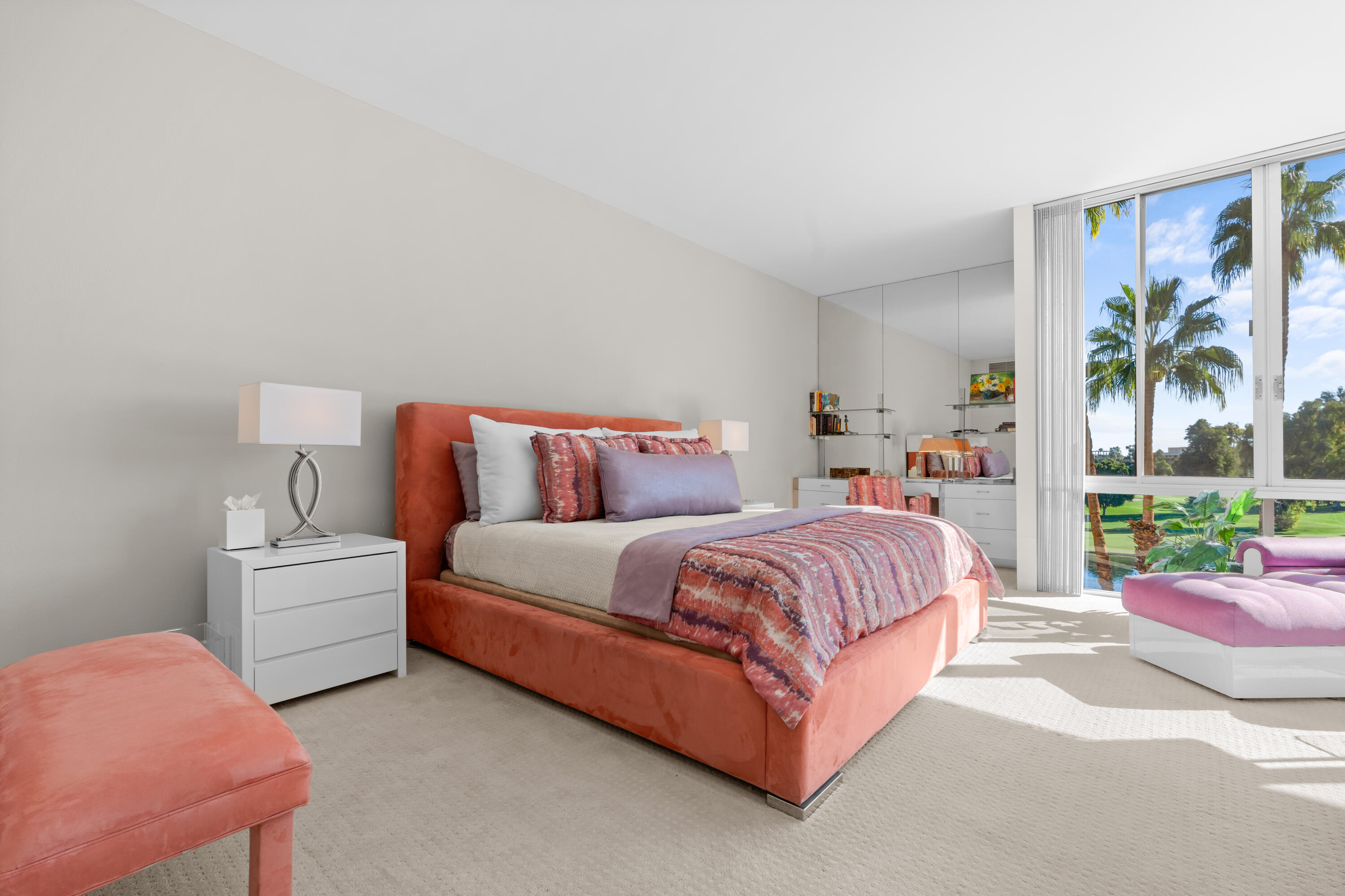 900 Island Drive, Unit 507 Rancho Mirage, CA 92270 - Photo 10 of 37 a spacious bedroom with a bed and a large window