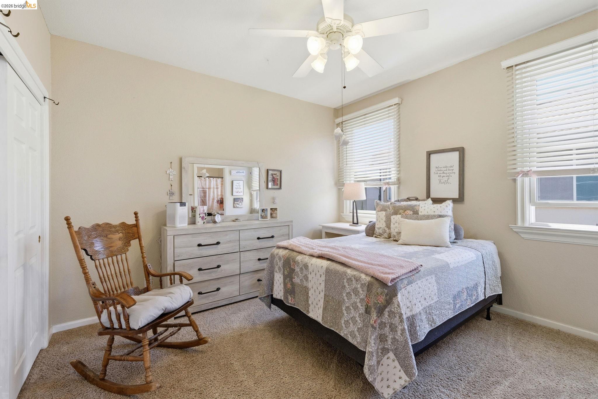 3438 Keystone Loop Discovery Bay, CA 94505 - Photo 31 of 57 a bedroom with a bed and a chair