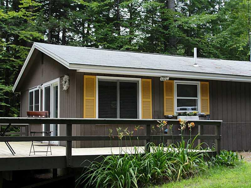 25 Hawk Road Bridgton, ME 04009 - Photo 3 of 28 Exterior Front. Large deck adds tons...