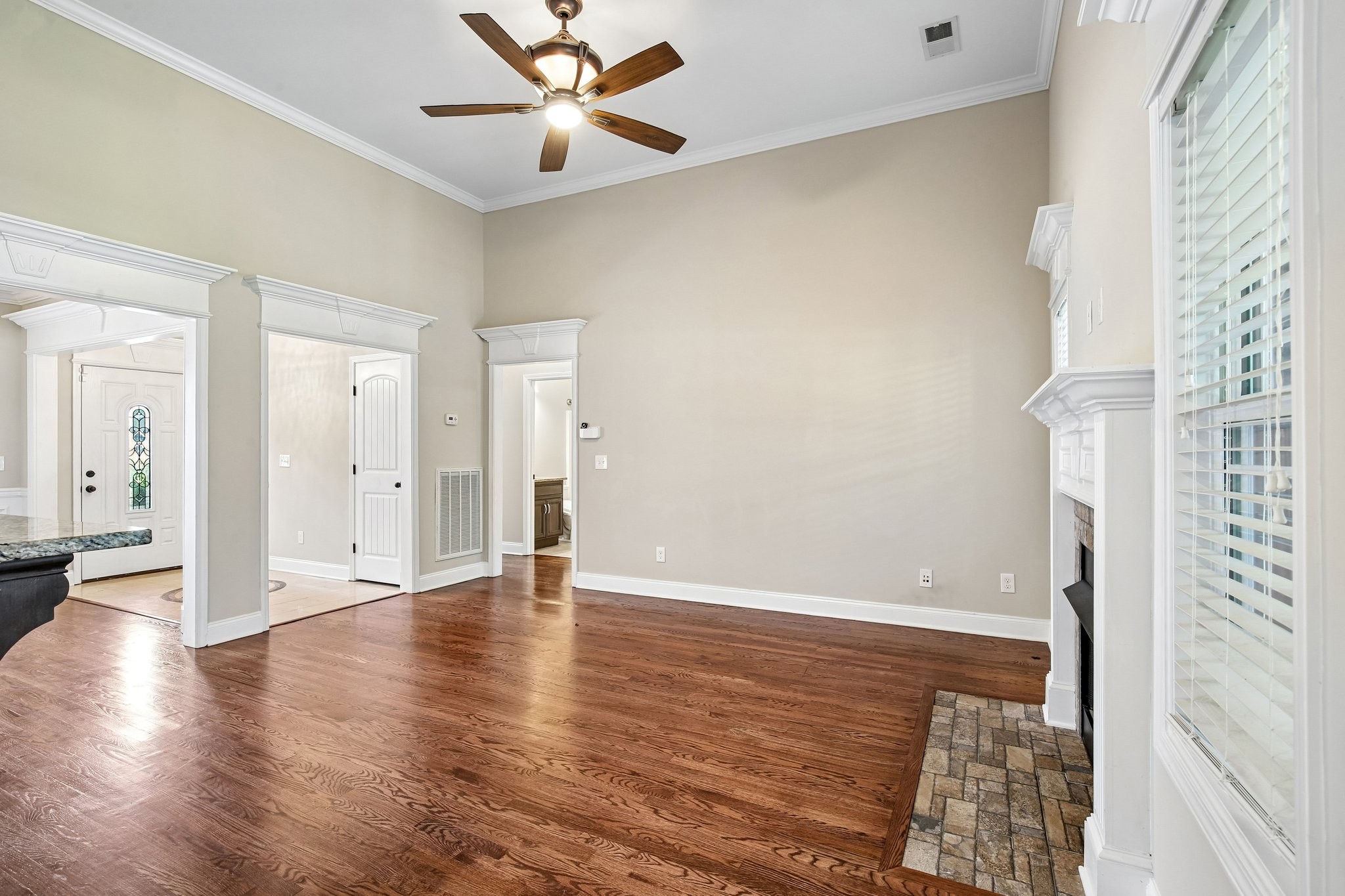 316 Amazonway Ridge Lascassas, TN 37085 - Photo 6 of 36 wooden floor in an empty room with a window