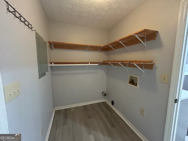 a view of a room with racks on the wall