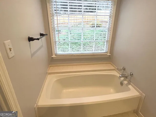 a bathroom with a bathtub