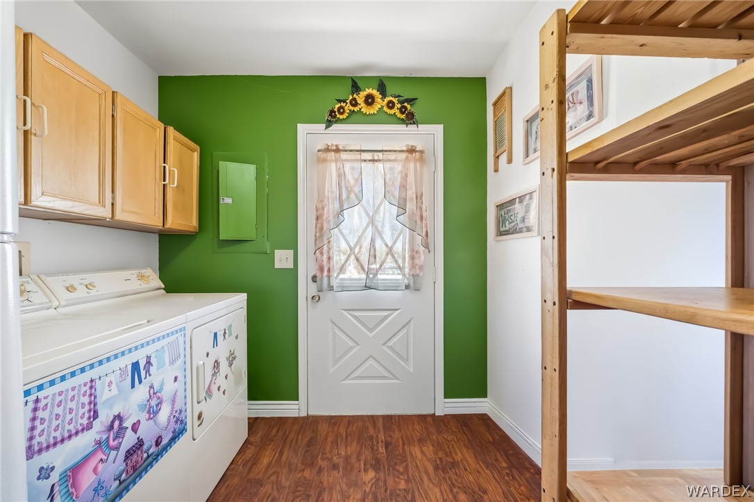 2401 North Stephan Road Kingman, AZ 86401 - Photo 59 of 92 Utility space featuring wood-finish flooring and a white door with a window