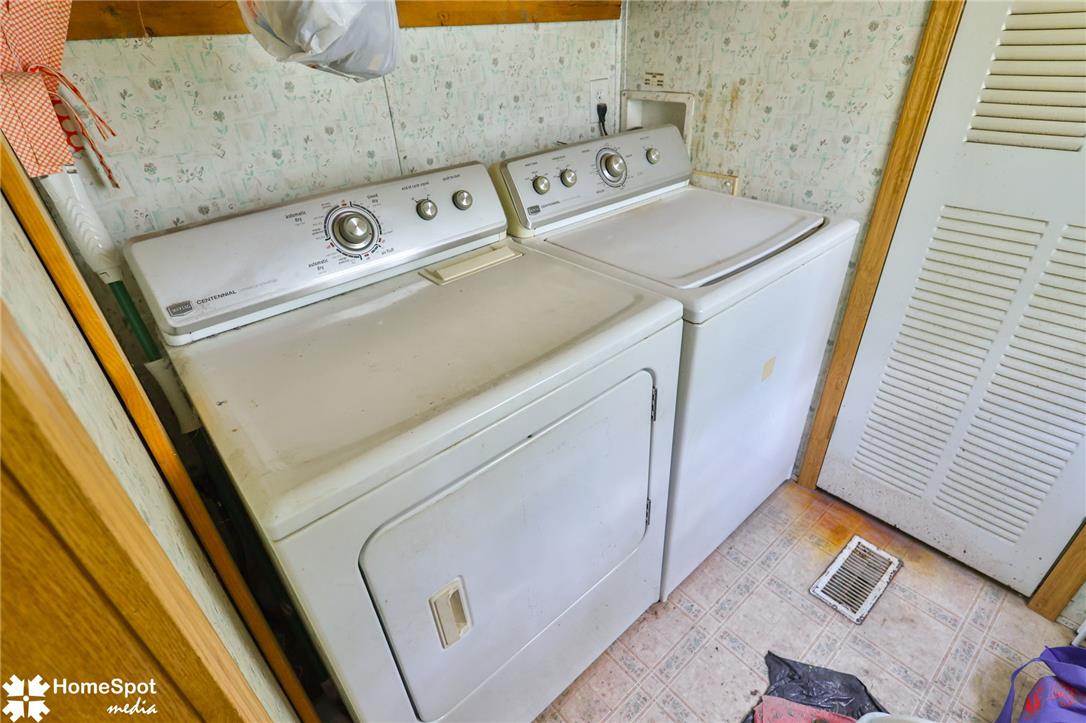 3795 Rhoades Road Kempton, PA 19529 - Photo 9 of 42 A well-equipped laundry space with washer and dryer set provides household convenience.