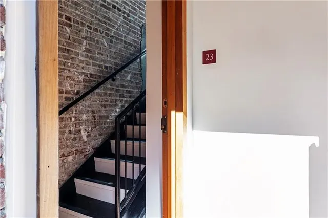 a brick building with a outdoor space