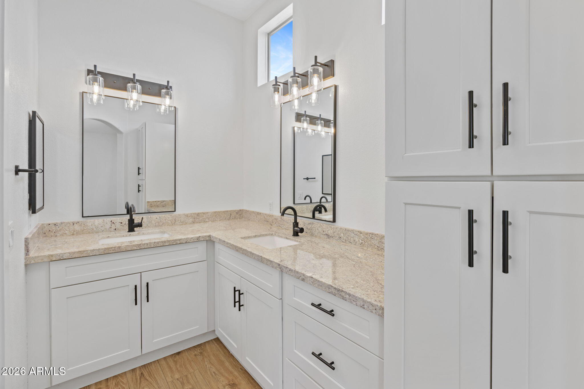280 South Evergreen Road, Unit 1368 Tempe, AZ 85288 - Photo 27 of 42 a bathroom with a double vanity sink and mirror