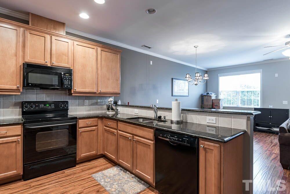 8238 Belneath Court Raleigh, NC 27613 - Photo 4 of 15 Granite counter tops, 2016 refrigerator that conveys!