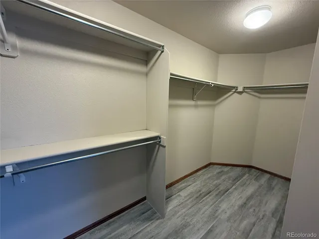 a view of an empty walk in closet