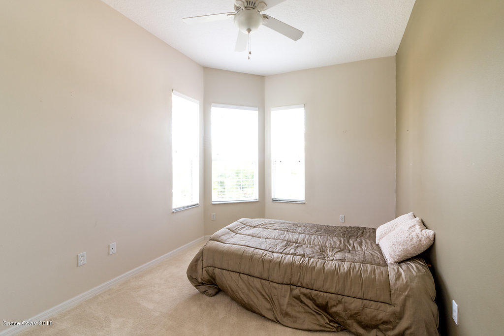 7151 Ralston Street Melbourne, FL 32940 - Photo 13 of 23 7151RalstonSt-bedrooom 2