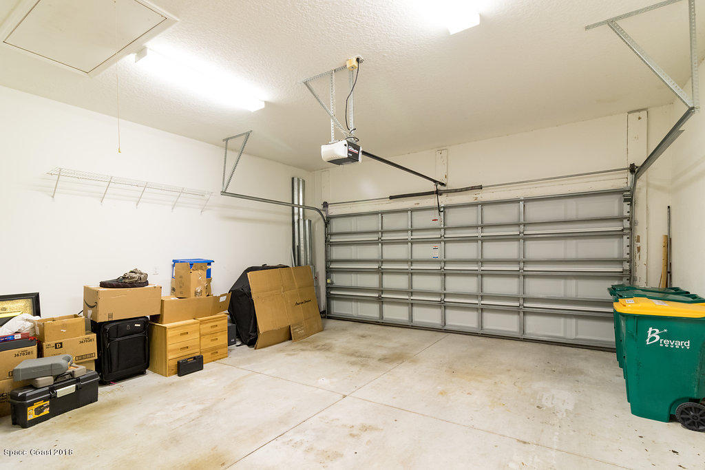 7151 Ralston Street Melbourne, FL 32940 - Photo 22 of 23 7151RalstonSt-garage 1