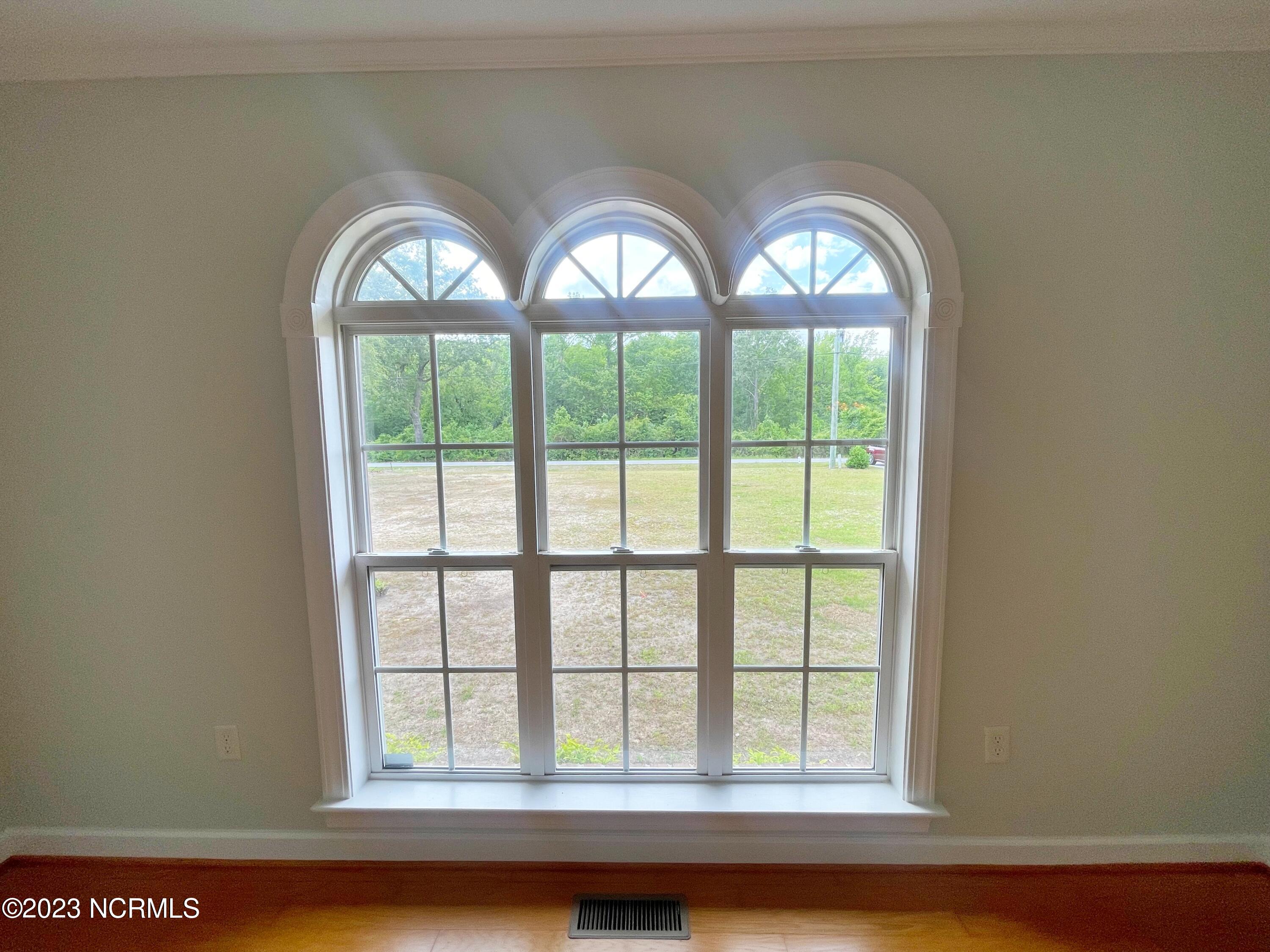 2047 Neuse Road Kinston, NC 28501 - Photo 18 of 49 NICE WINDOWS IN LIVING ROOM