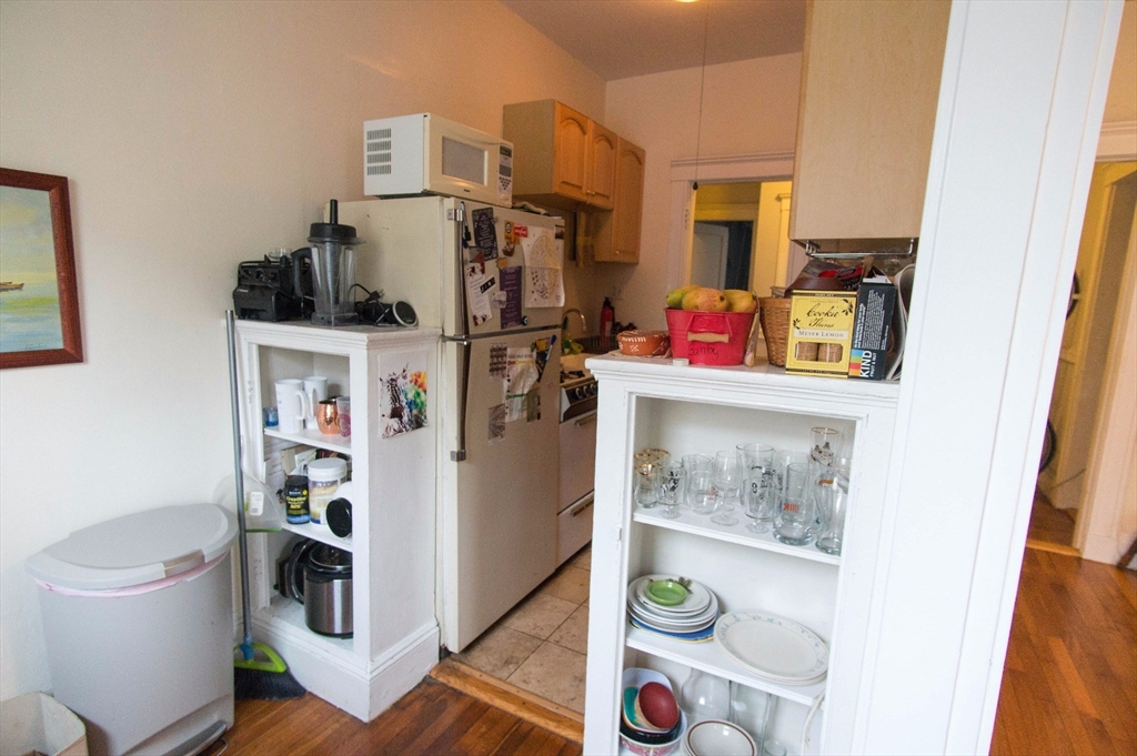 233 Kelton Street, Unit 1 Boston, MA 02134 - Photo 11 of 11 a living room with furniture and a window
