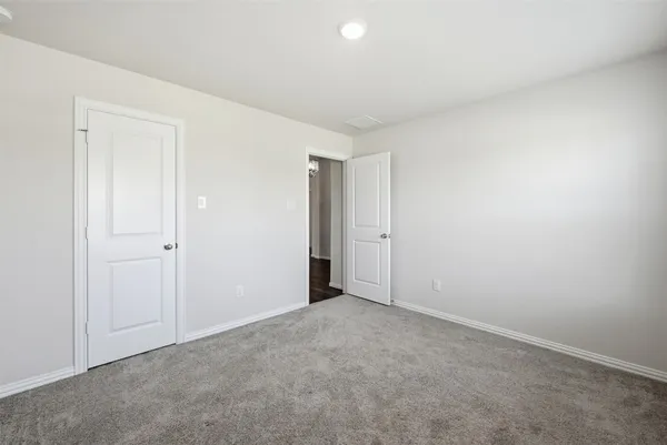 an empty room with an entryway
