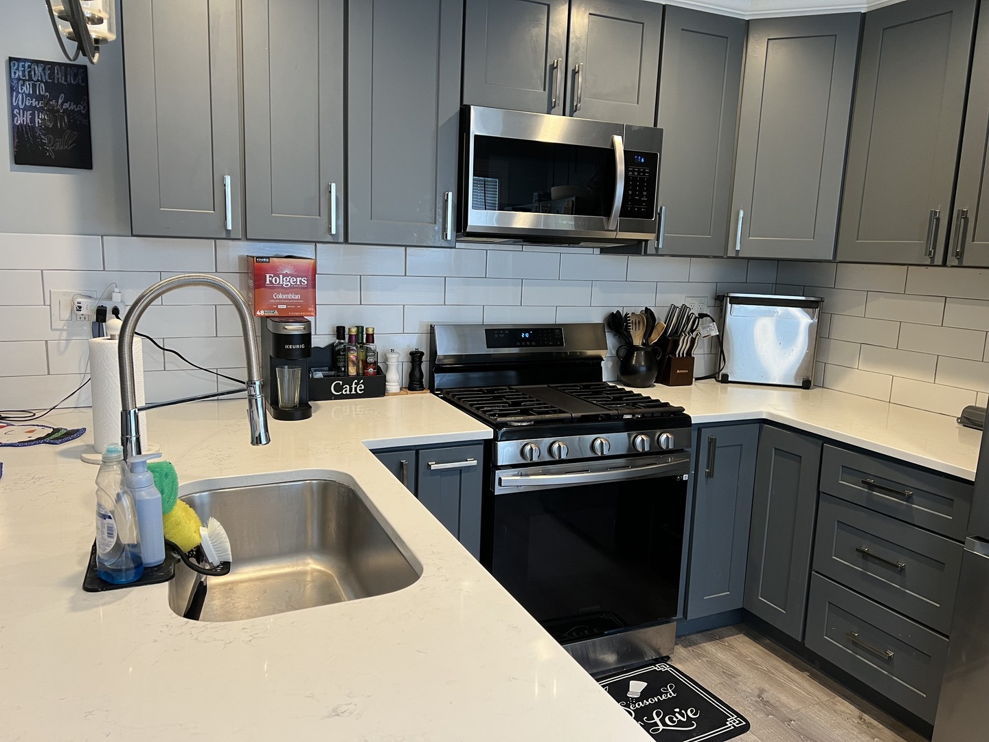 1205 Rattray Drive Algonquin, IL 60102 - Photo 5 of 28 a kitchen with a sink stove and microwave