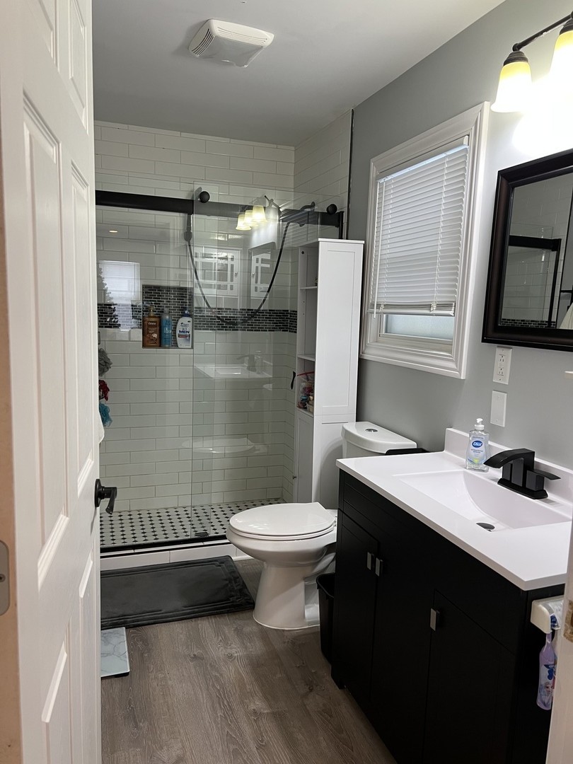 1205 Rattray Drive Algonquin, IL 60102 - Photo 10 of 28 a bathroom with a sink toilet and shower