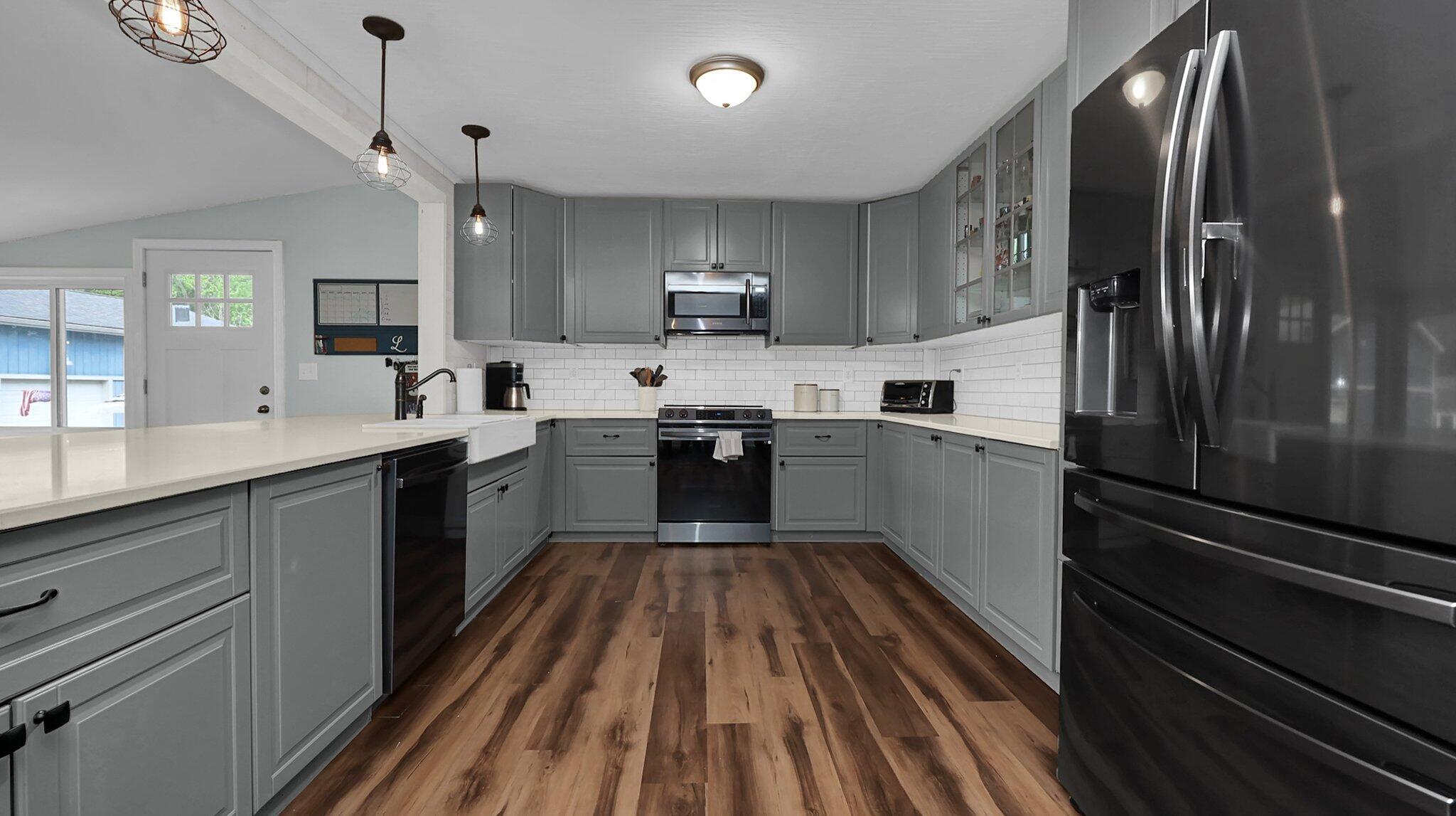 7790 Schott Road Westerville, OH 43081 - Photo 14 of 50 With cabinets galore and updated stainless steal appliances, you'll have no problem feeding a hungry crowd! Quart counters, custom backsplash, farmhouse sink, and so much more!