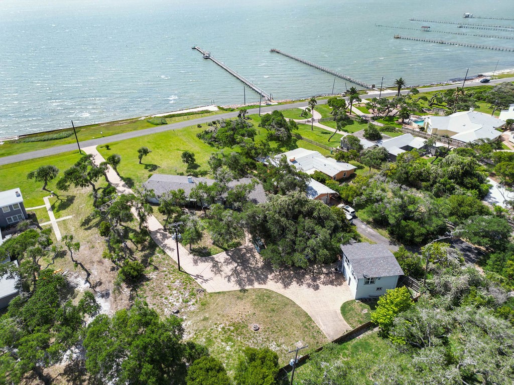 1931 North Fulton Beach Road Rockport, TX 78382 - Photo 3 of 40 a view of swimming pool with a yard