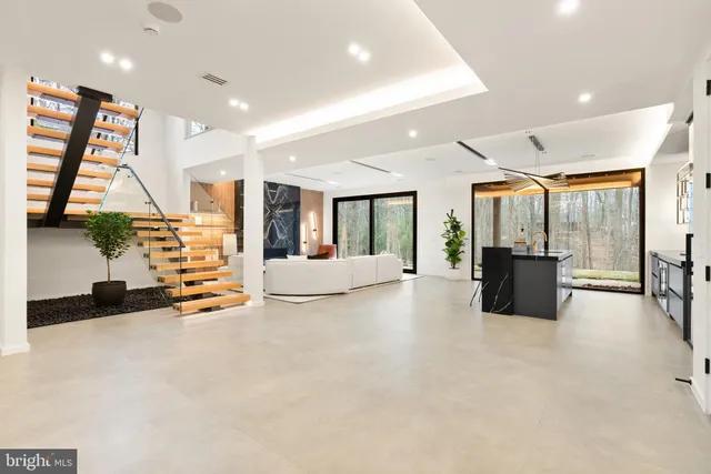 a bedroom with a bed and a couch