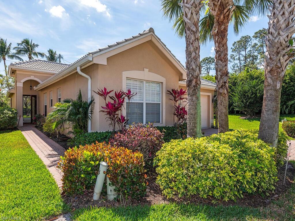 1595 Triangle Palm Terrace Naples, FL 34119 - Photo 1 of 21