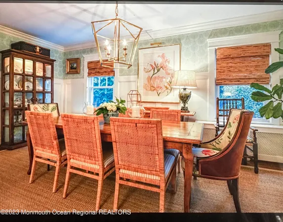 a bedroom with two beds and painted walls