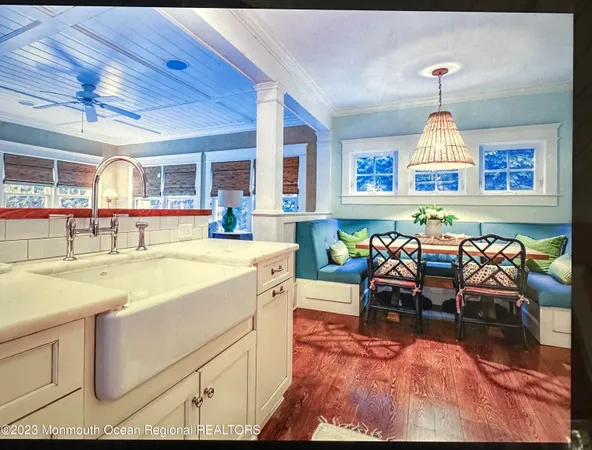 a kitchen with stainless steel appliances granite countertop a stove and a refrigerator