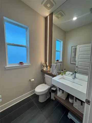 a children room with toys and a flat screen tv