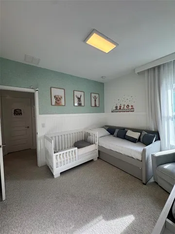 a view of storage and utility room with closet