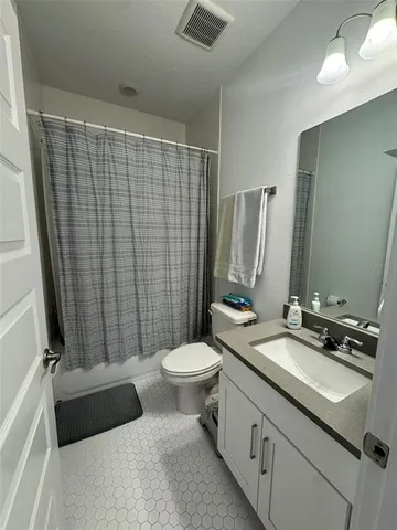 a view of a golf course with green space