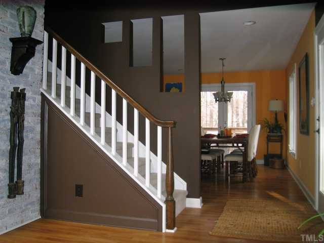 8804 Boar's Head Court Raleigh, NC 27613 - Photo 4 of 12 The open staircase was one of the many innovative and practical ideas incorporated into this renovation. Also, all of the windows in the home were replaced; most are casement windows with screens that are placed inside (where they don't get dirty!).