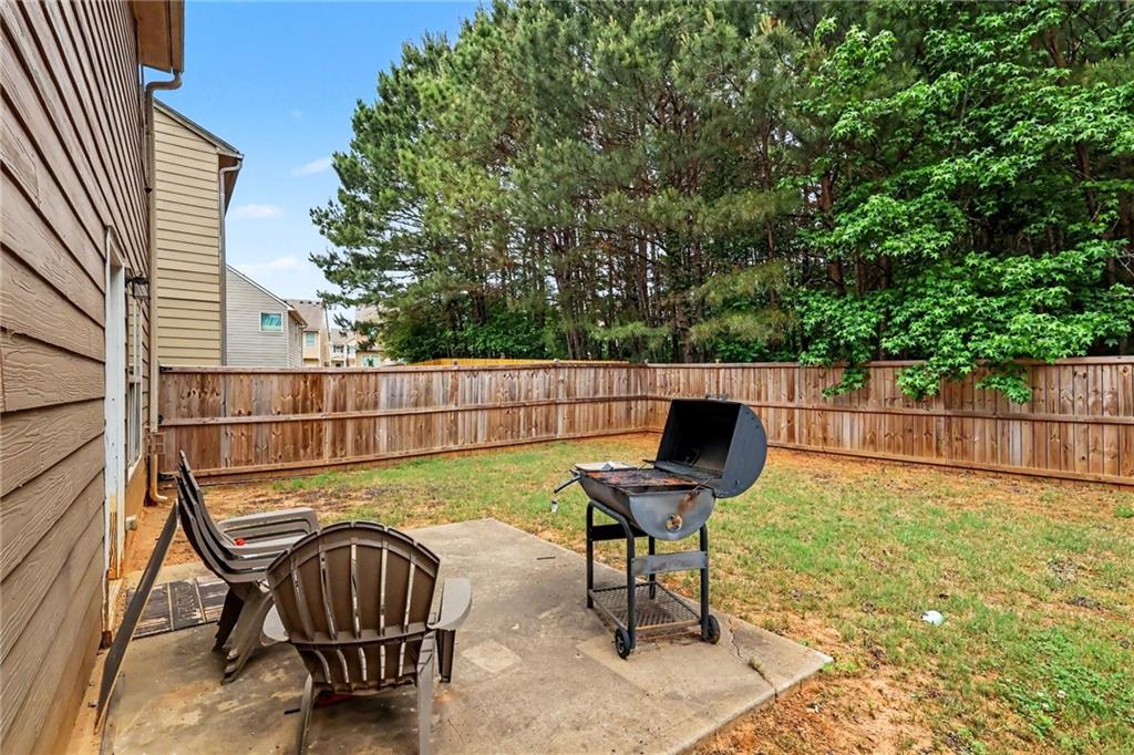 2780 Lakeview Walk Decatur, GA 30035 - Photo 37 of 37 a view of a chairs and backyard with furniture