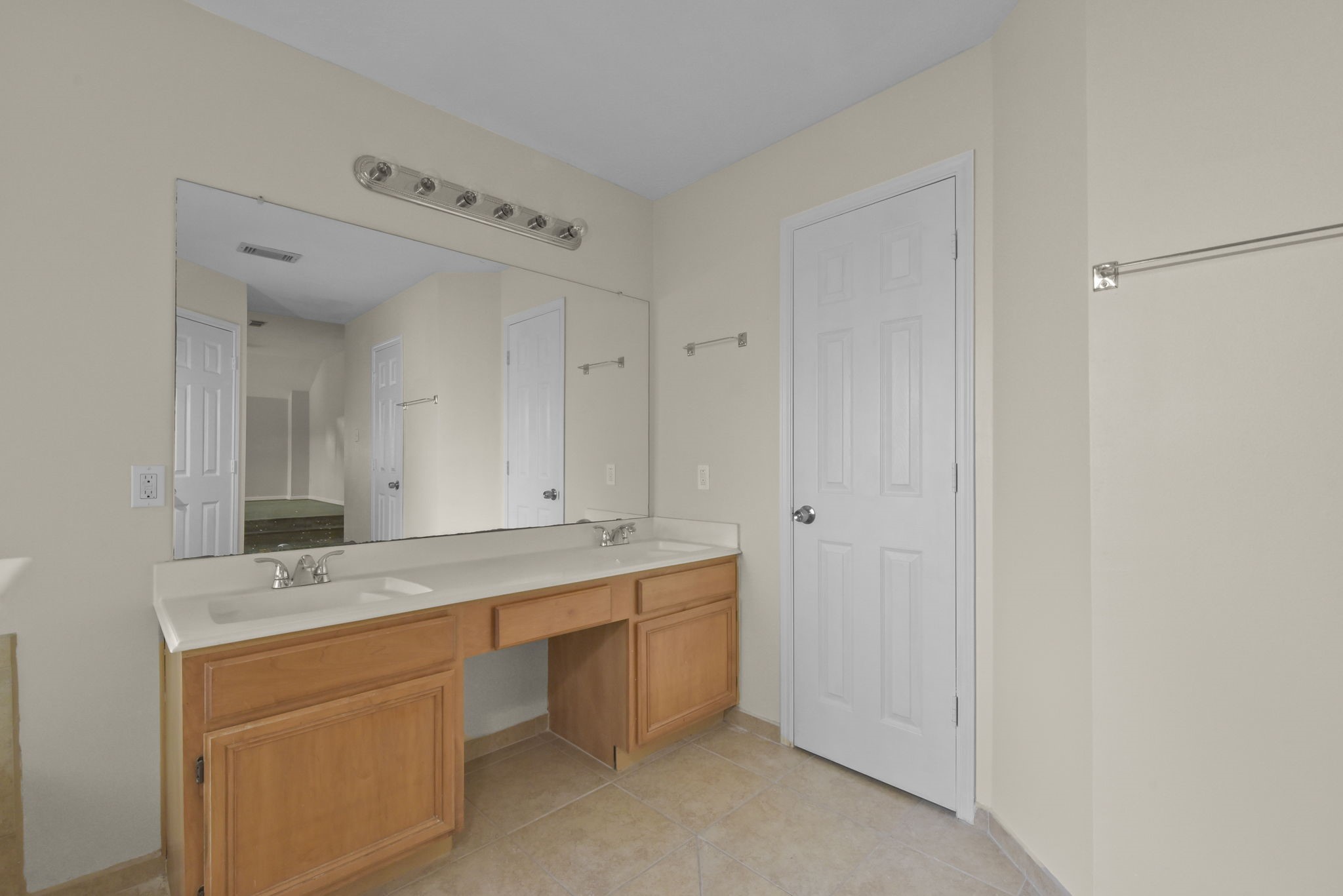 4911 Silver Fox Drive Houston, TX 77066 - Photo 21 of 33 a bathroom with a granite countertop sink mirror and double