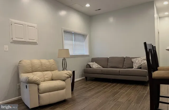 a living room with furniture and a couch