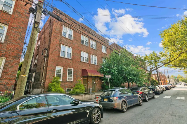 a car parked in front of a building