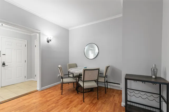 a view of a livingroom with furniture and wooden floor