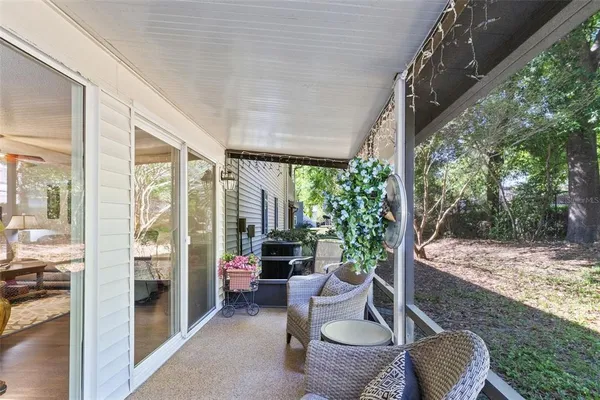 a outdoor living space with furniture and garden view