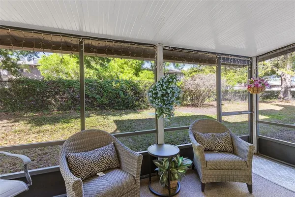 a living room with patio and furniture