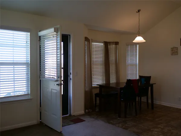 a kitchen with stainless steel appliances granite countertop a stove a microwave and oven