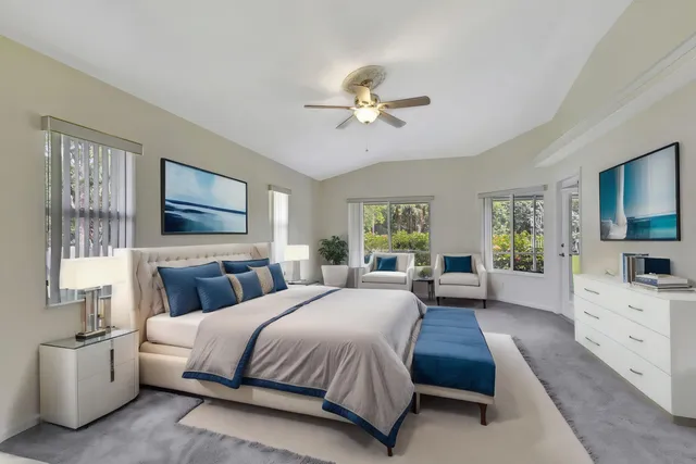 a large spacious bathroom with a large tub and sink
