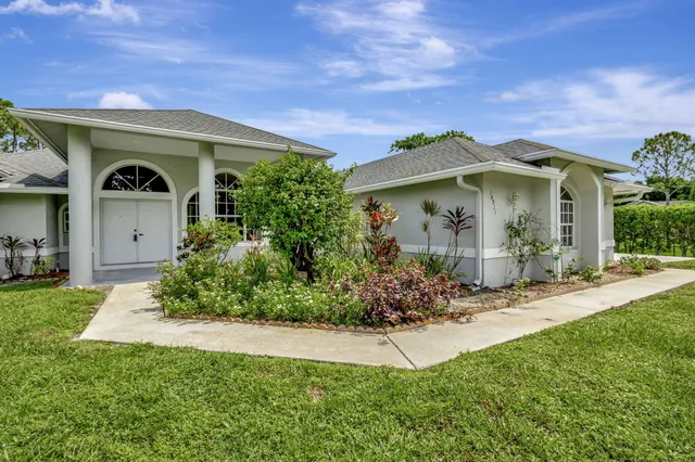 a view of a garden with a fountain