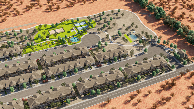 990 Manen Street Washington, UT 84780 - Photo 40 of 43 Aerial overview of a residential community featuring rows of townhomes, a green space with multiple sports courts, a swimming pool, and a dedicated play area