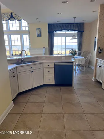 a bedroom with a bed and a table